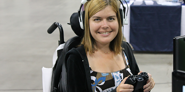 a woman in a wheelchair playing a game