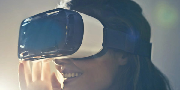 A woman with a pair of virtual reality glasses